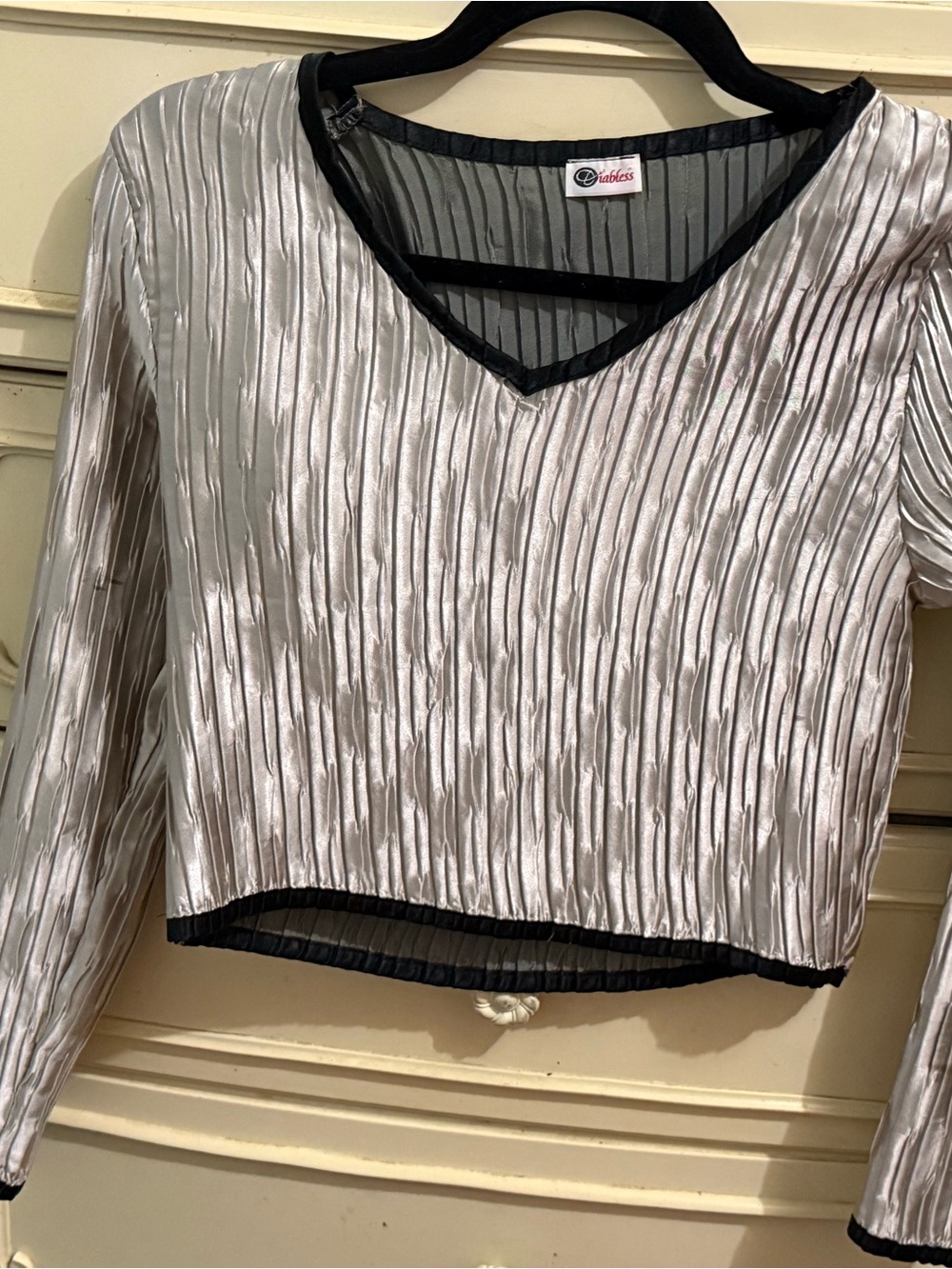 Silver Pleated V-Neck Women's Blouse with Black Trim